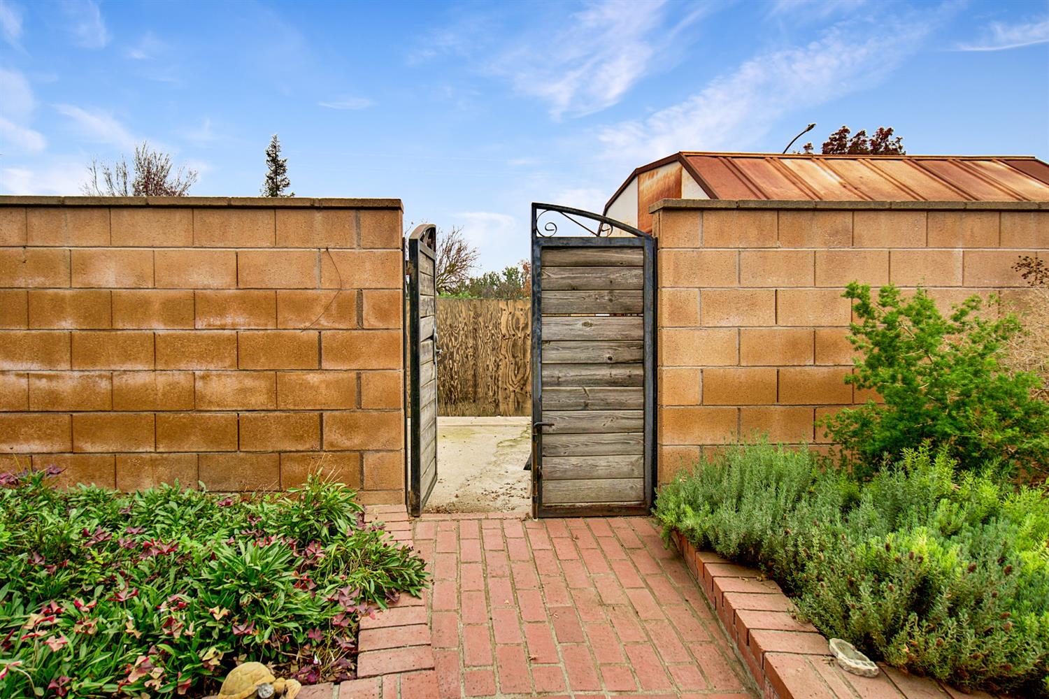 1004 Joy Street Madera, CA 93637 - Photo 27 of 29 a view of a door with an outdoor space
