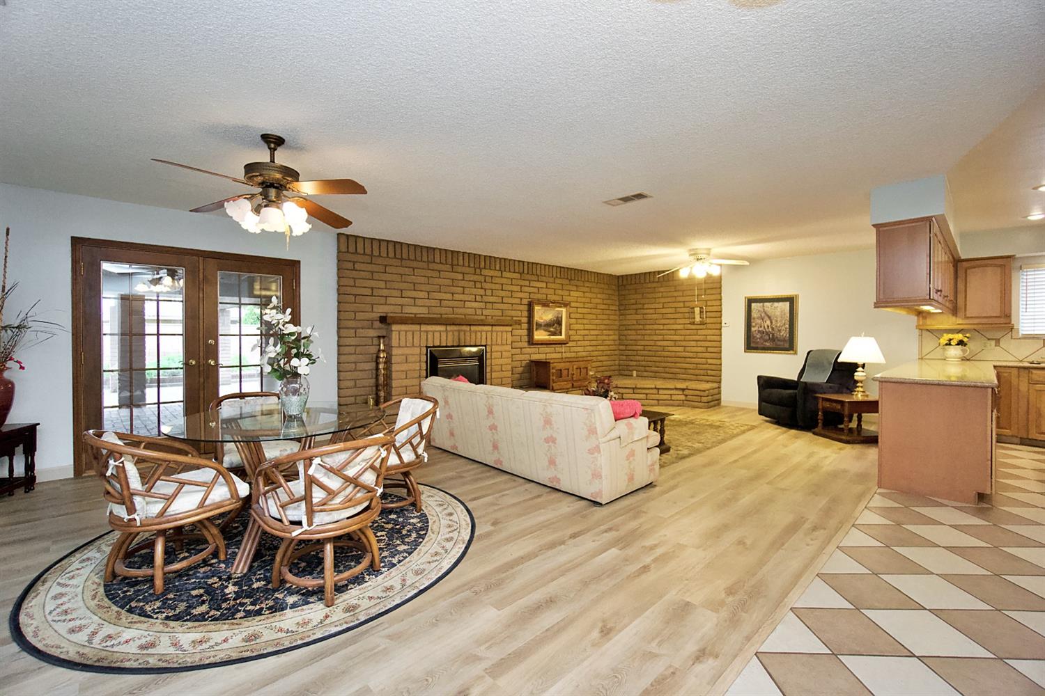1004 Joy Street Madera, CA 93637 - Photo 8 of 29 a living room with furniture and a large window