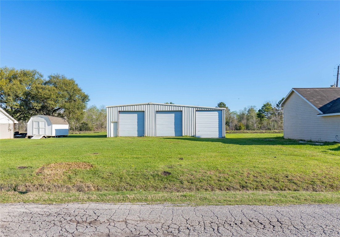 1324 Alpha Lane Crosby, TX 77532 - Photo 1 of 20 a backyard of a house with lots of green space and outdoor space