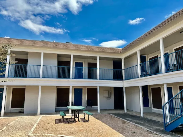 a house view with a outdoor space