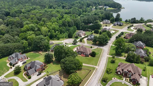 an aerial view of residential house with outdoor space