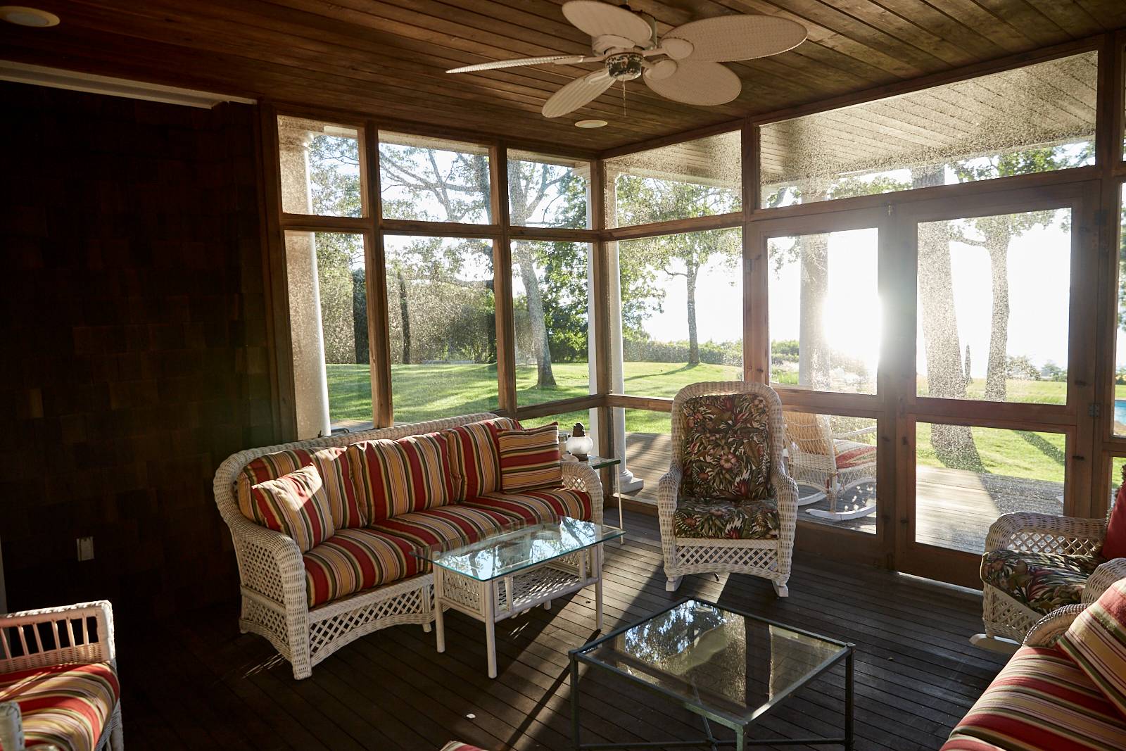 27 Rawson Road Sag Harbor, NY 11963 - Photo 13 of 14 a living room with furniture and floor to ceiling windows