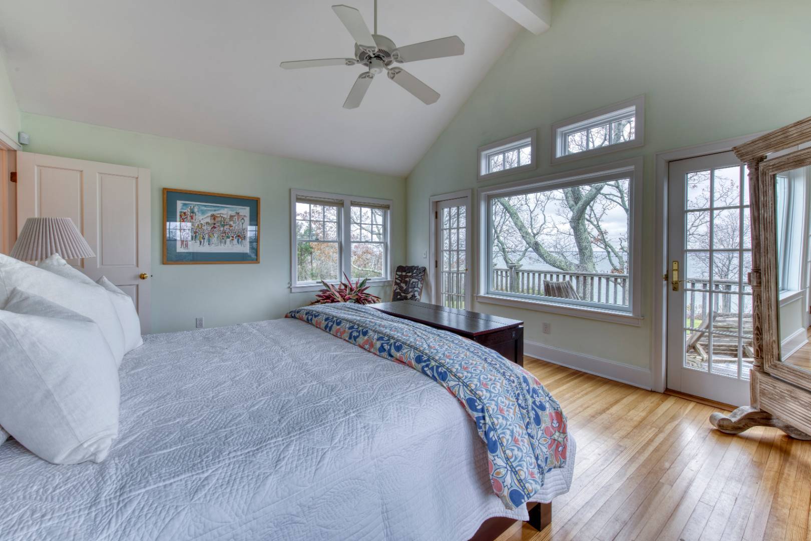 27 Rawson Road Sag Harbor, NY 11963 - Photo 6 of 14 a spacious bedroom with a large bed and a large window
