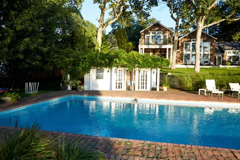 a view of a house with swimming pool