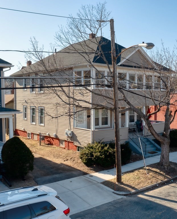 7-9 Kosciusko Street Springfield, MA 01151 - Photo 3 of 21 a front view of a building with streets and trees