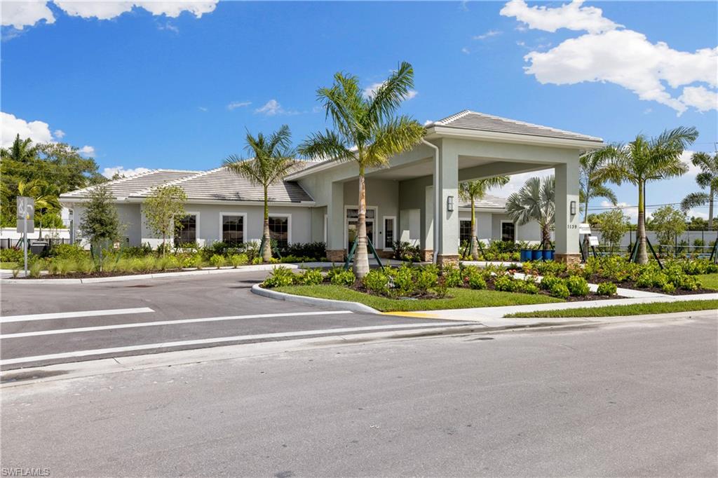 1213 Enbrook Loop Naples, FL 34114 - Photo 18 of 24 a view of a building with a yard
