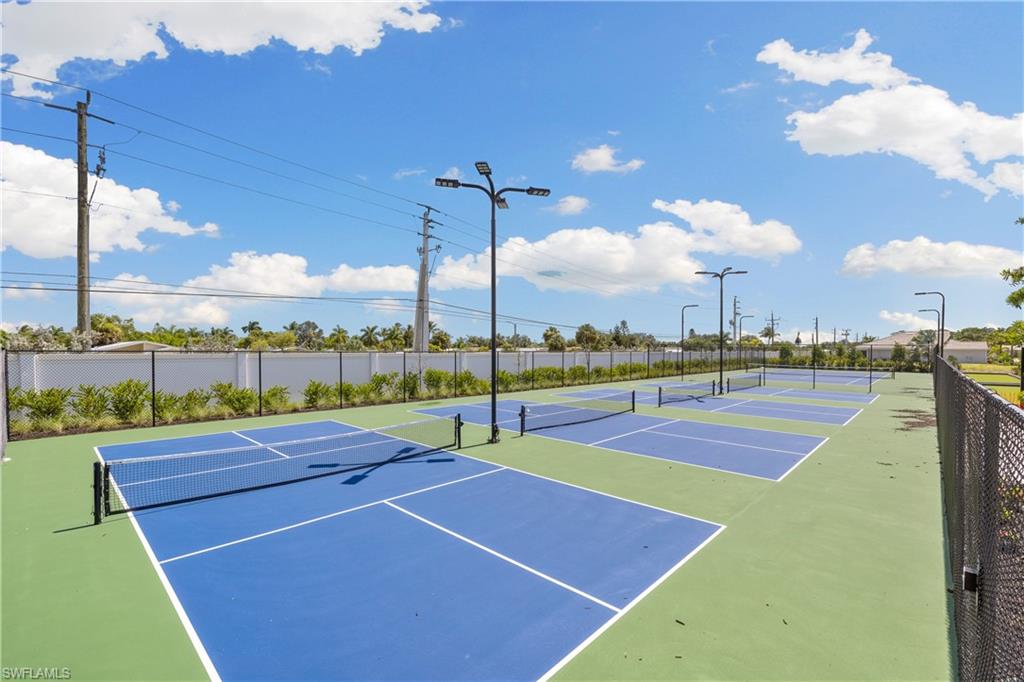 1213 Enbrook Loop Naples, FL 34114 - Photo 19 of 24 a view of a tennis court