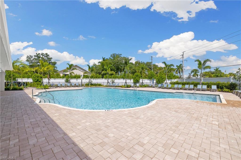 1213 Enbrook Loop Naples, FL 34114 - Photo 20 of 24 a view of a swimming pool and an outdoor space