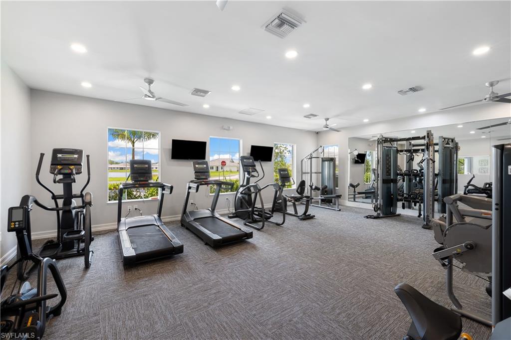 1213 Enbrook Loop Naples, FL 34114 - Photo 21 of 24 a view of a room with gym equipment