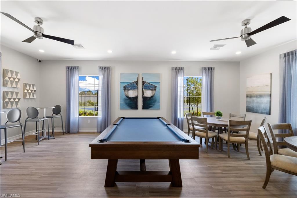 1213 Enbrook Loop Naples, FL 34114 - Photo 22 of 24 a outdoor space with furniture a window and a rug