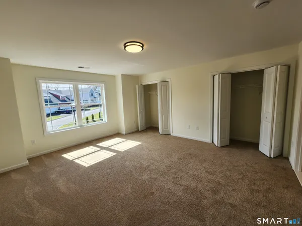 an empty room with windows