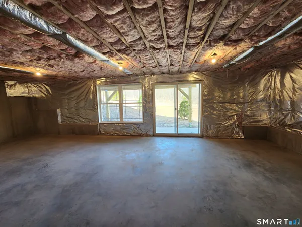 a view of a room with windows