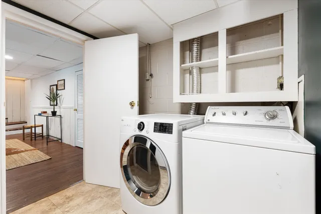 a utility room with dryer and washer