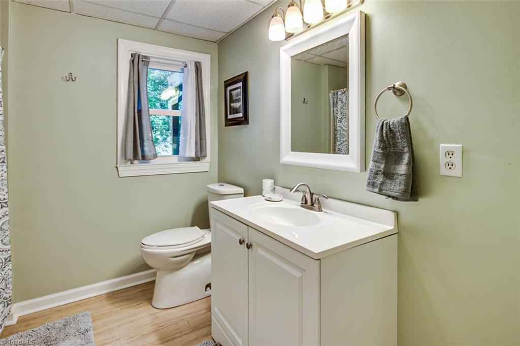 614 Inwood Road Asheboro, NC 27205 - Photo 26 of 33 Basement full bath, LVP floors