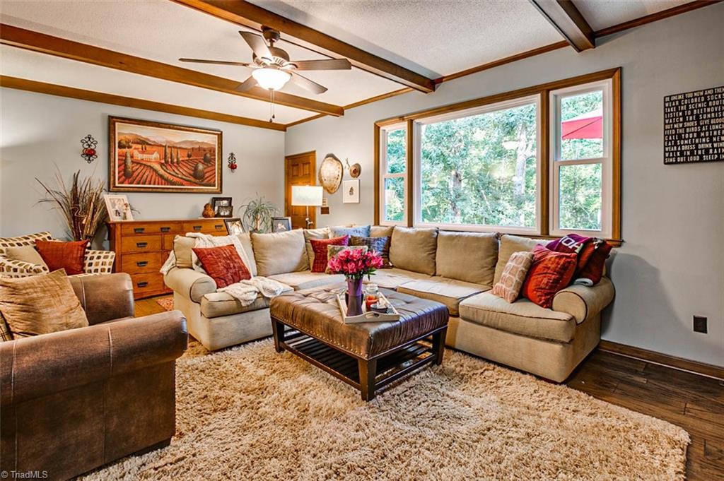 614 Inwood Road Asheboro, NC 27205 - Photo 4 of 33 Living room, exposed beams & hardwoods