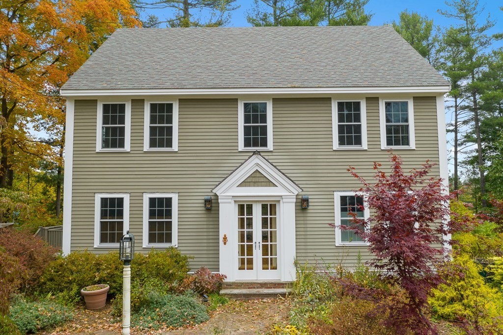 68 Frost Road Tyngsborough, MA 01879 - Photo 1 of 37 a house view with a garden space