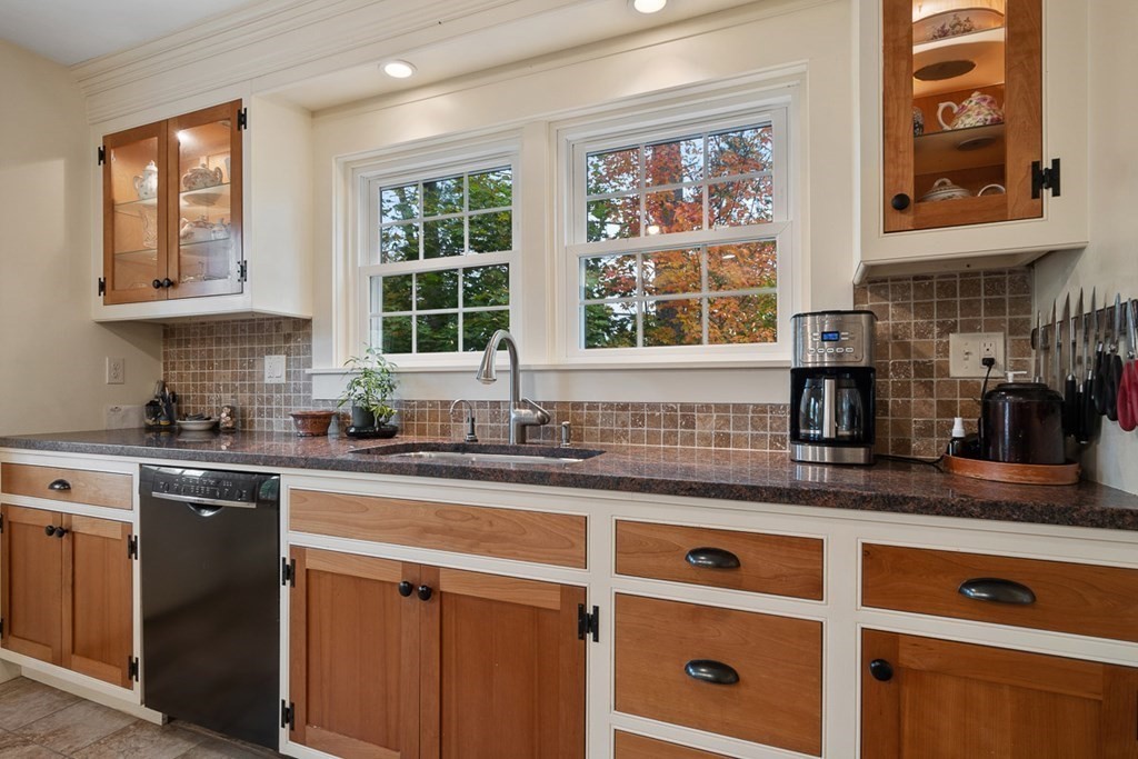 68 Frost Road Tyngsborough, MA 01879 - Photo 3 of 37 a kitchen with stainless steel appliances granite countertop a sink and a window