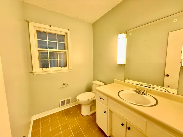 a view of an entryway with a chandelier