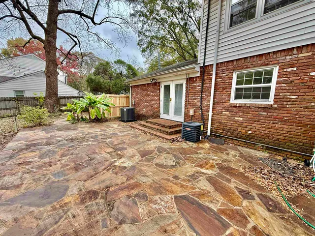 a view of a garden with trees