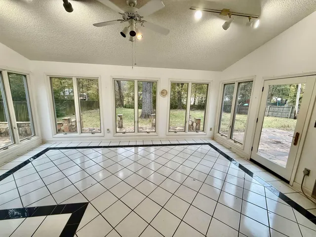 a kitchen with stainless steel appliances granite countertop a sink and cabinets