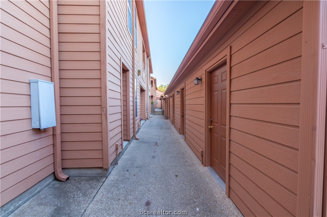 1305 West Villa Maria Road, Unit A103 Bryan, TX 77801 - Photo 1 of 1 a view of a pathway of a house