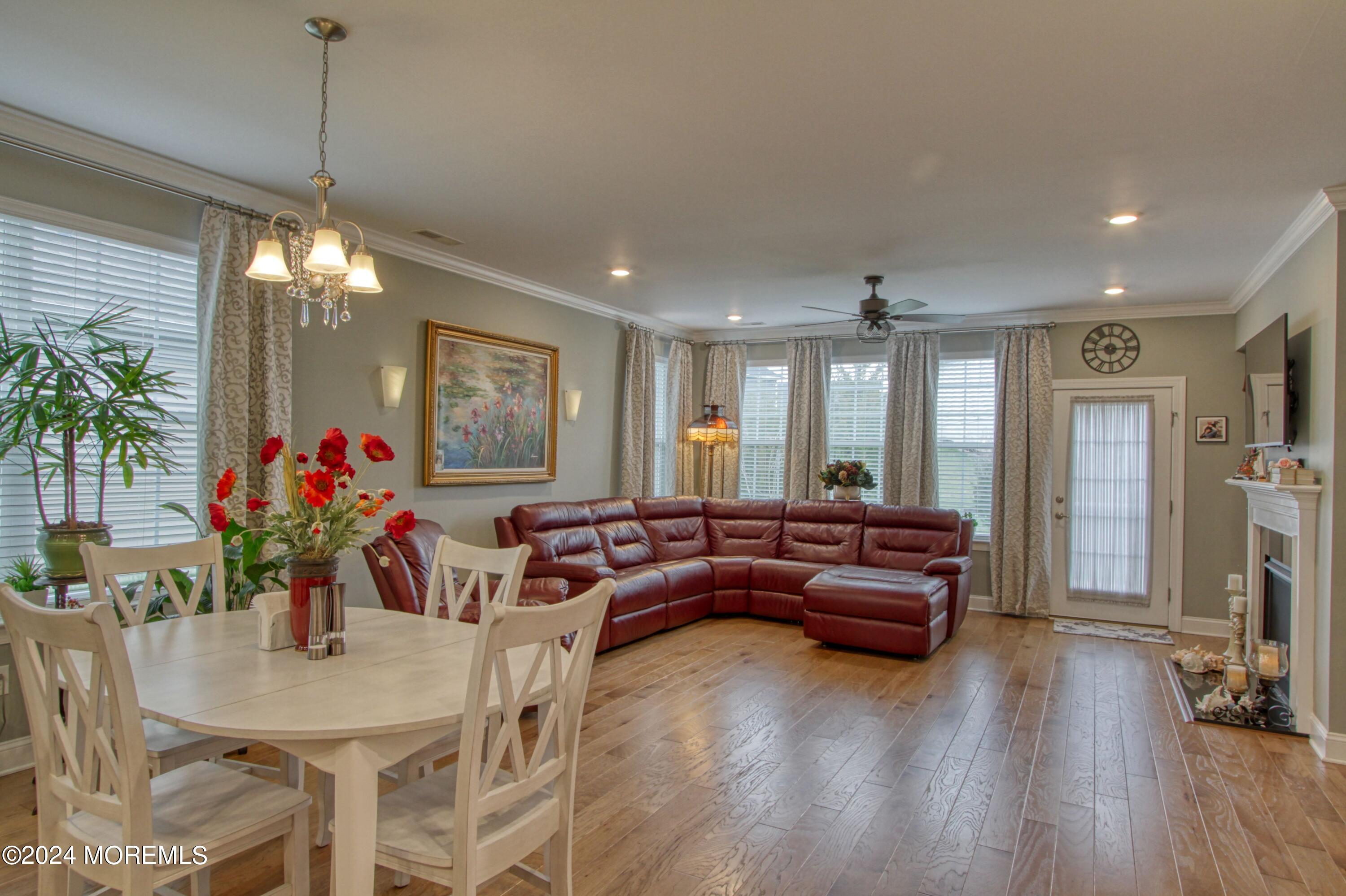 39 Butler Drive Barnegat, NJ 08005 - Photo 12 of 62 a living room with furniture dining room and wooden floor