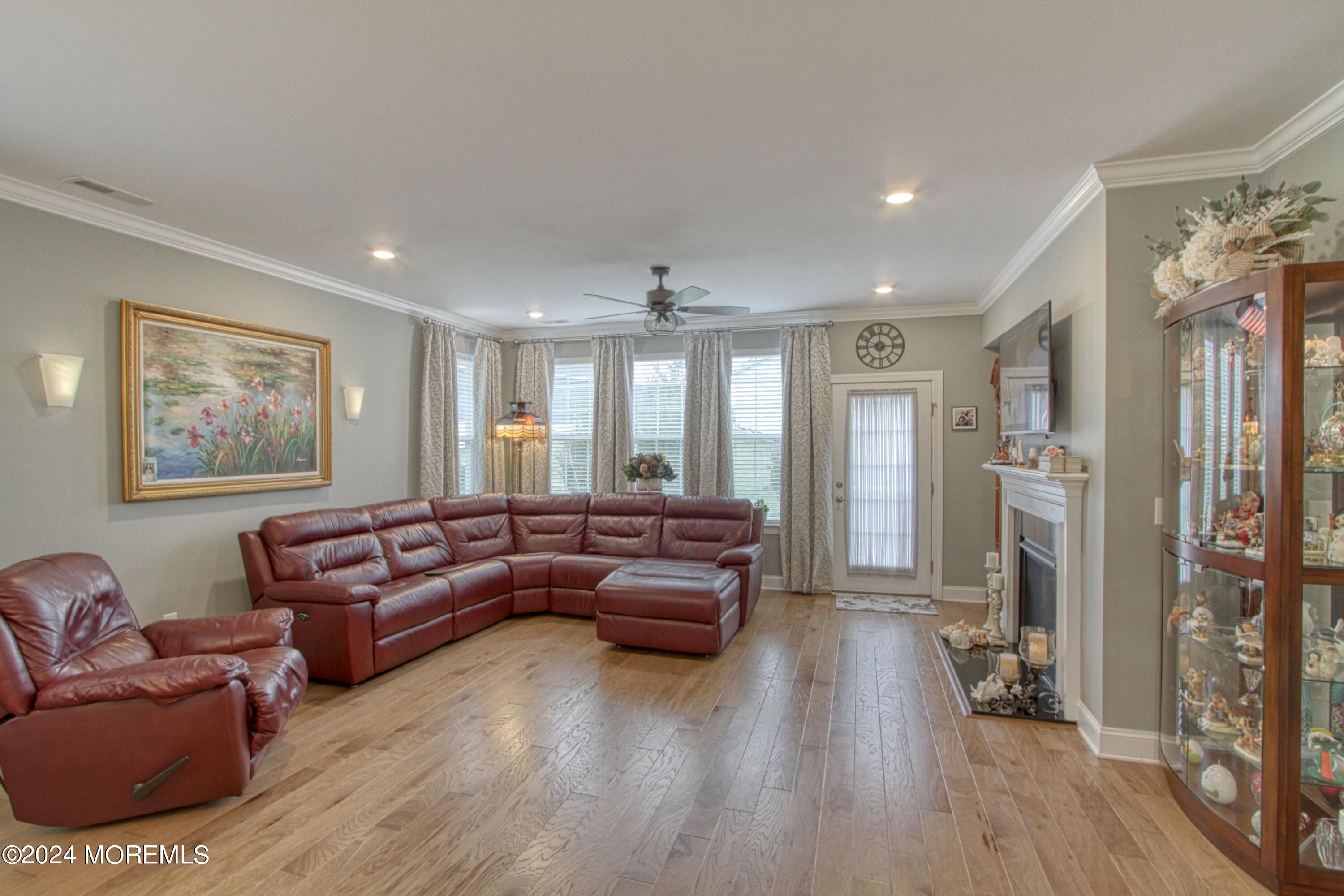 39 Butler Drive Barnegat, NJ 08005 - Photo 13 of 62 a living room with furniture and a wooden floor