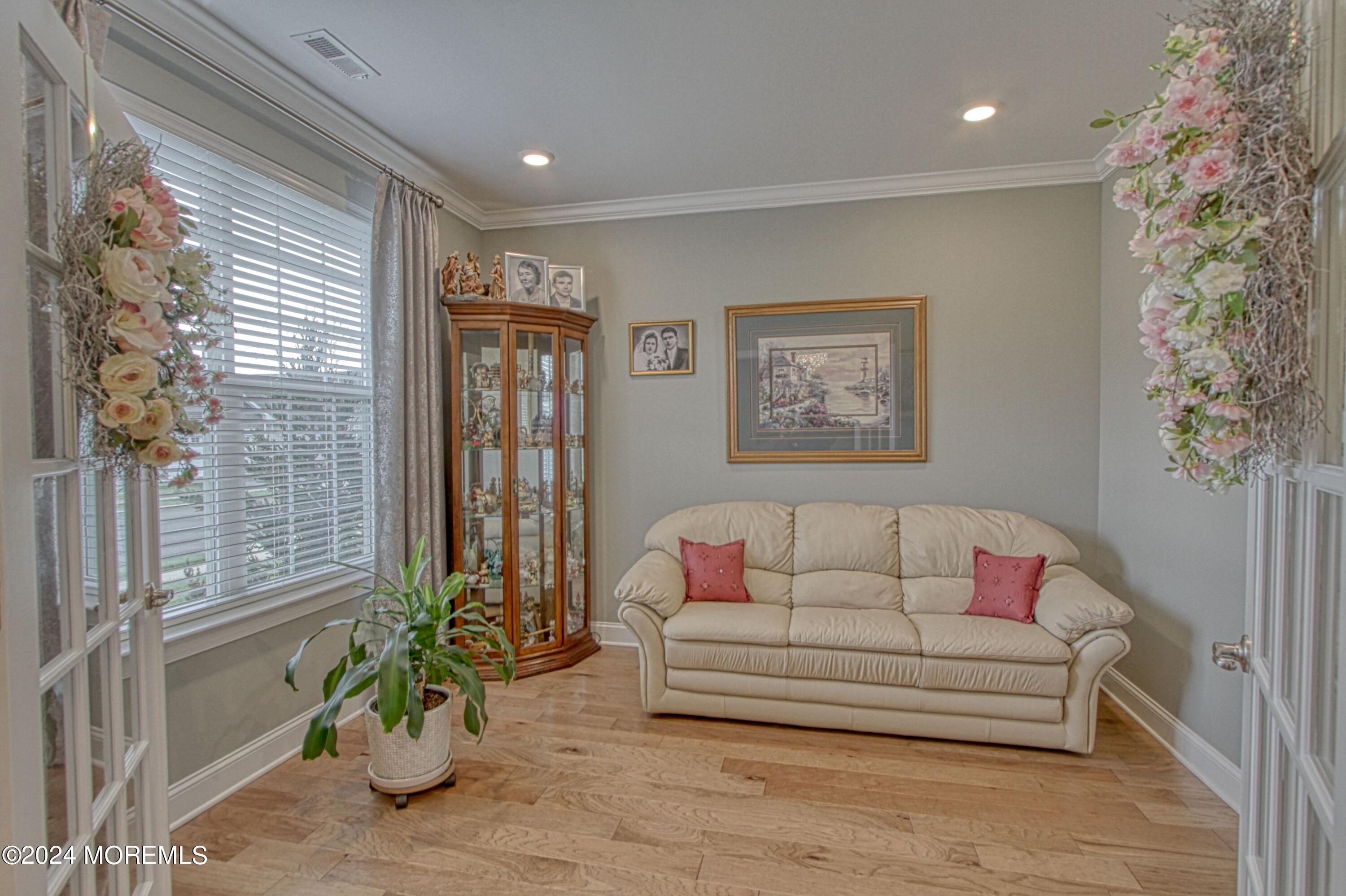 39 Butler Drive Barnegat, NJ 08005 - Photo 22 of 62 a living room with furniture and a potted plant