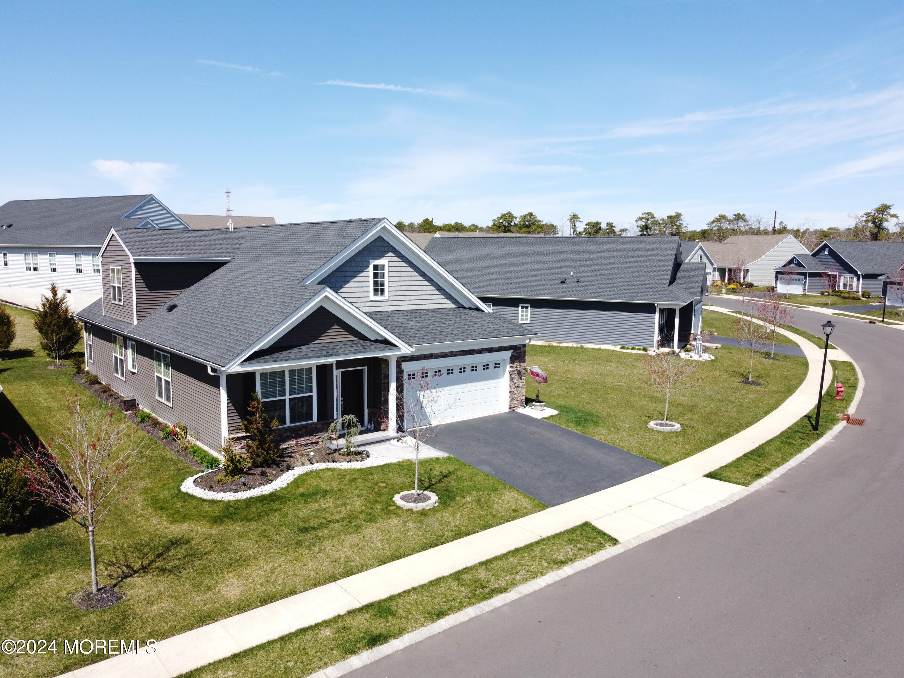 39 Butler Drive Barnegat, NJ 08005 - Photo 33 of 62 a view of a house with swimming pool and a yard