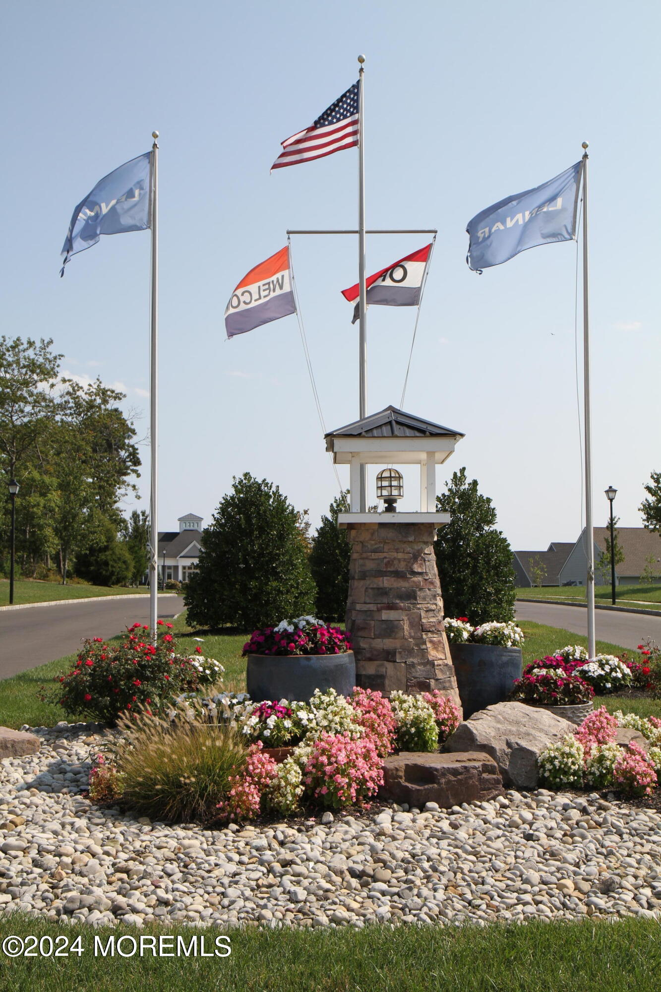 39 Butler Drive Barnegat, NJ 08005 - Photo 42 of 62 a front view of a house with a yard and outdoor seating