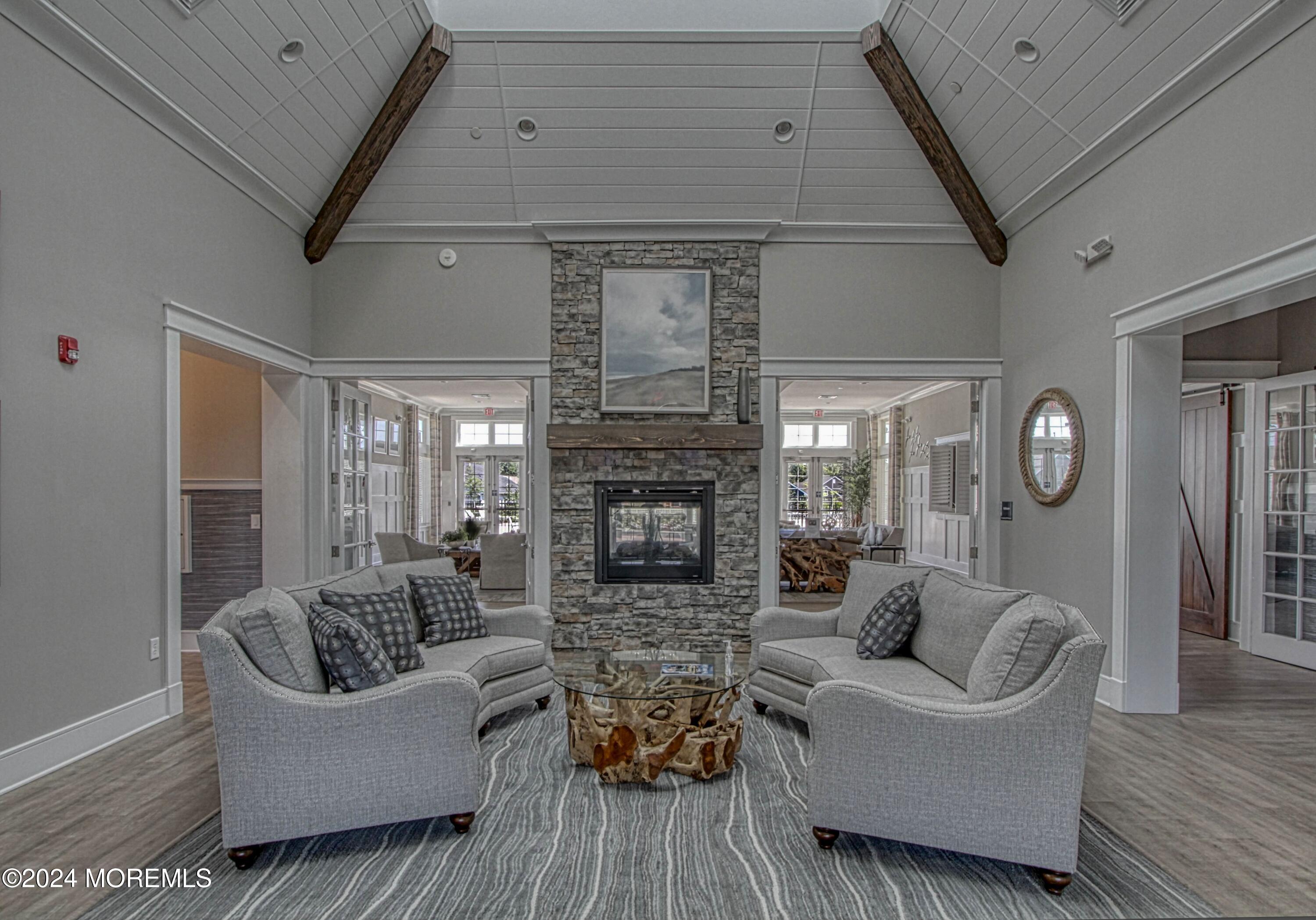 39 Butler Drive Barnegat, NJ 08005 - Photo 45 of 62 a living room with furniture and a fireplace