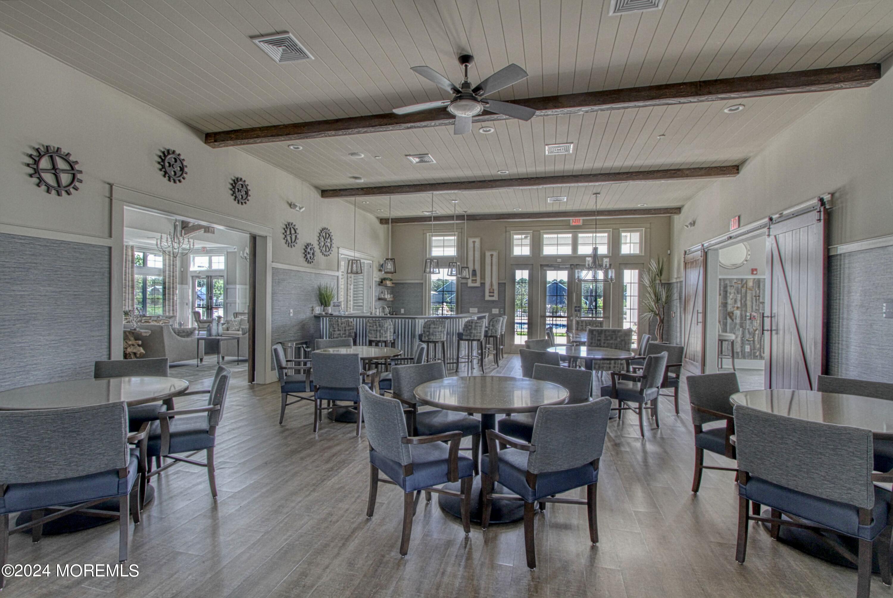 39 Butler Drive Barnegat, NJ 08005 - Photo 50 of 62 a dining room with furniture window and wooden floor