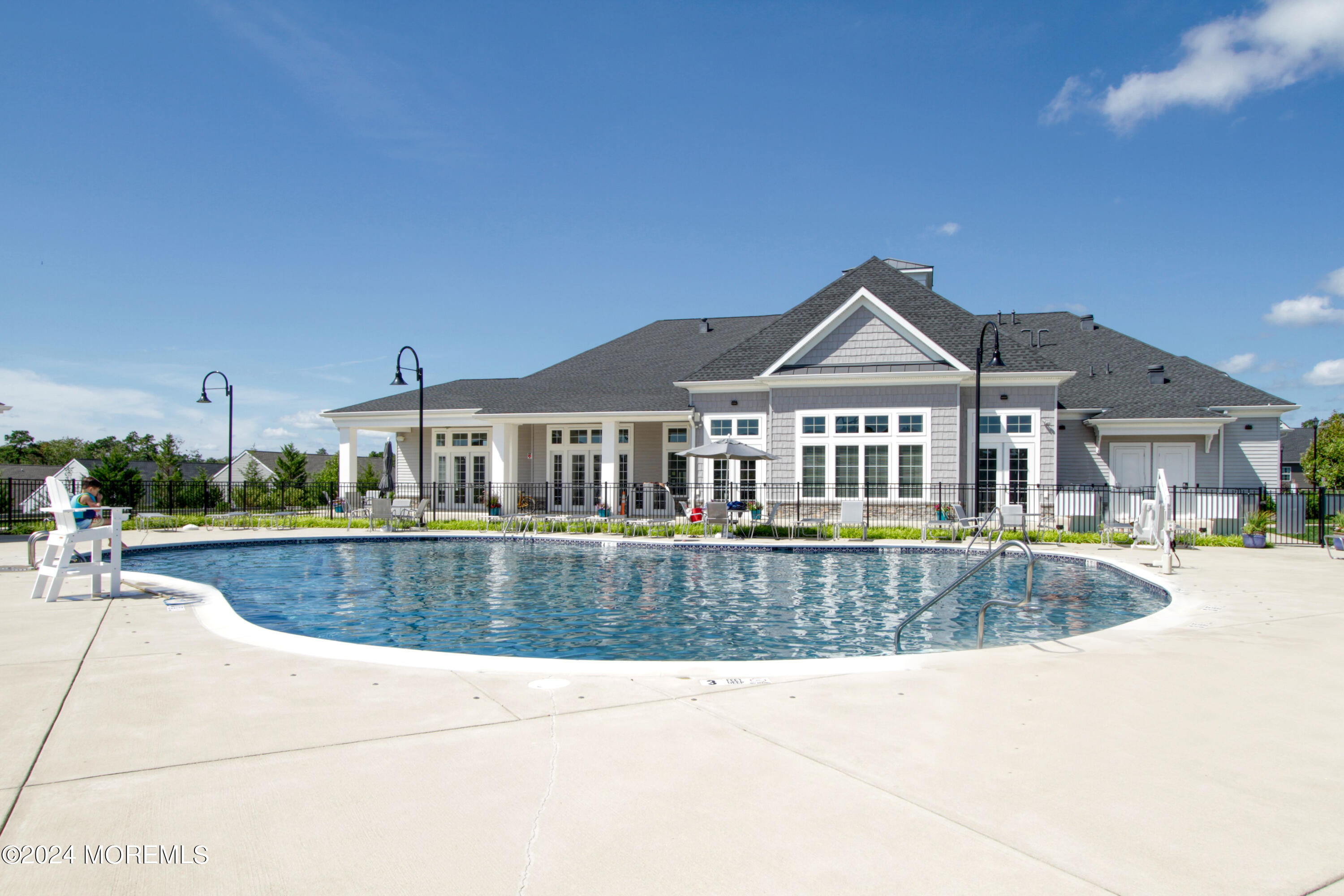 39 Butler Drive Barnegat, NJ 08005 - Photo 56 of 62 a front view of a house with swimming pool and porch