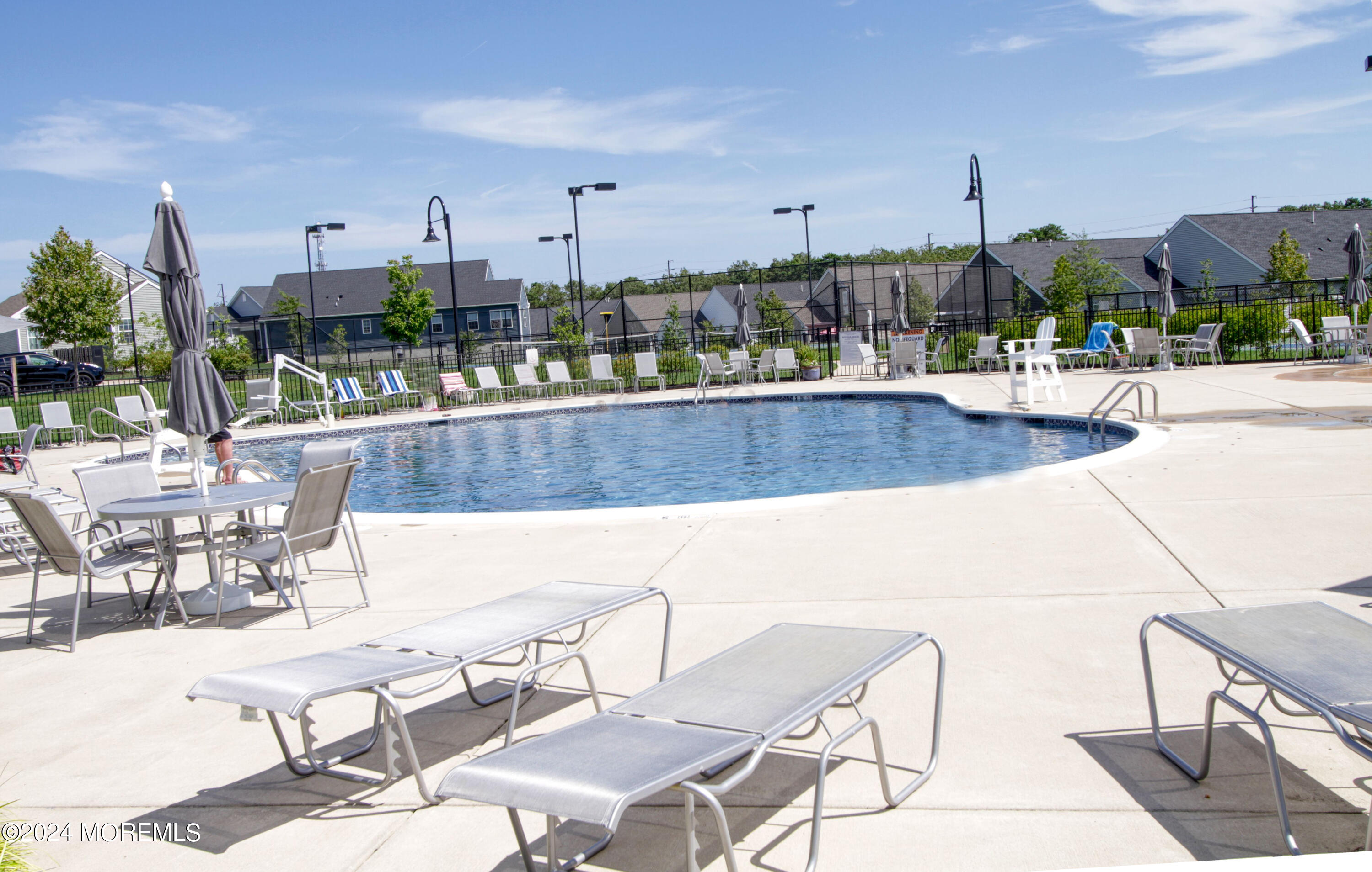 39 Butler Drive Barnegat, NJ 08005 - Photo 57 of 62 a view of a terrace with furniture and city view