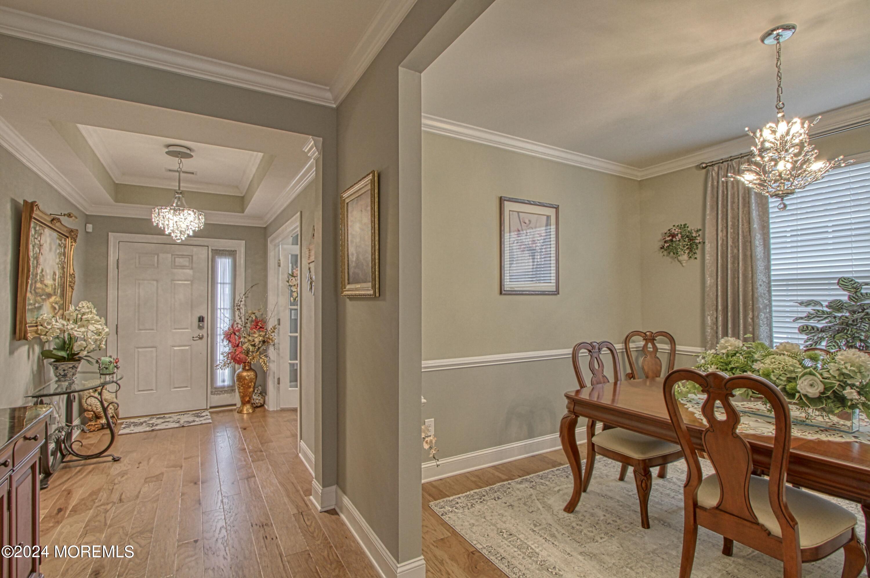 39 Butler Drive Barnegat, NJ 08005 - Photo 9 of 62 a view of a livingroom with furniture window and wooden floor