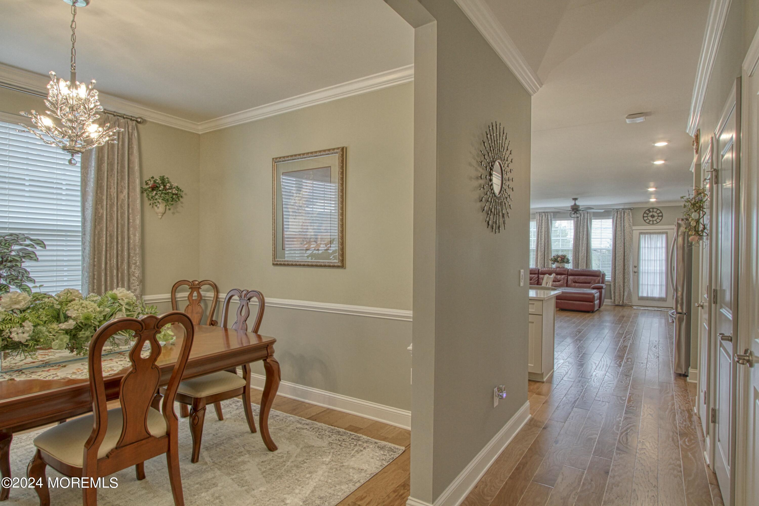 39 Butler Drive Barnegat, NJ 08005 - Photo 10 of 62 a view of a dining room with furniture and wooden floor