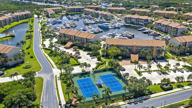 an aerial view of residential house with outdoor space and swimming pool
