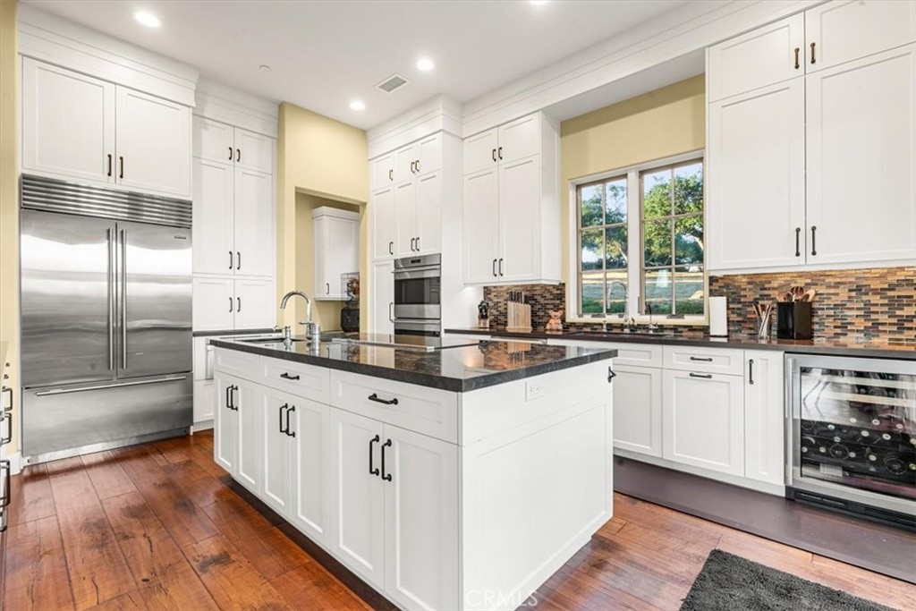 455 Mission Springs Road Arroyo Grande, CA 93420 - Photo 14 of 65 a kitchen with stainless steel appliances granite countertop a stove a sink and a refrigerator