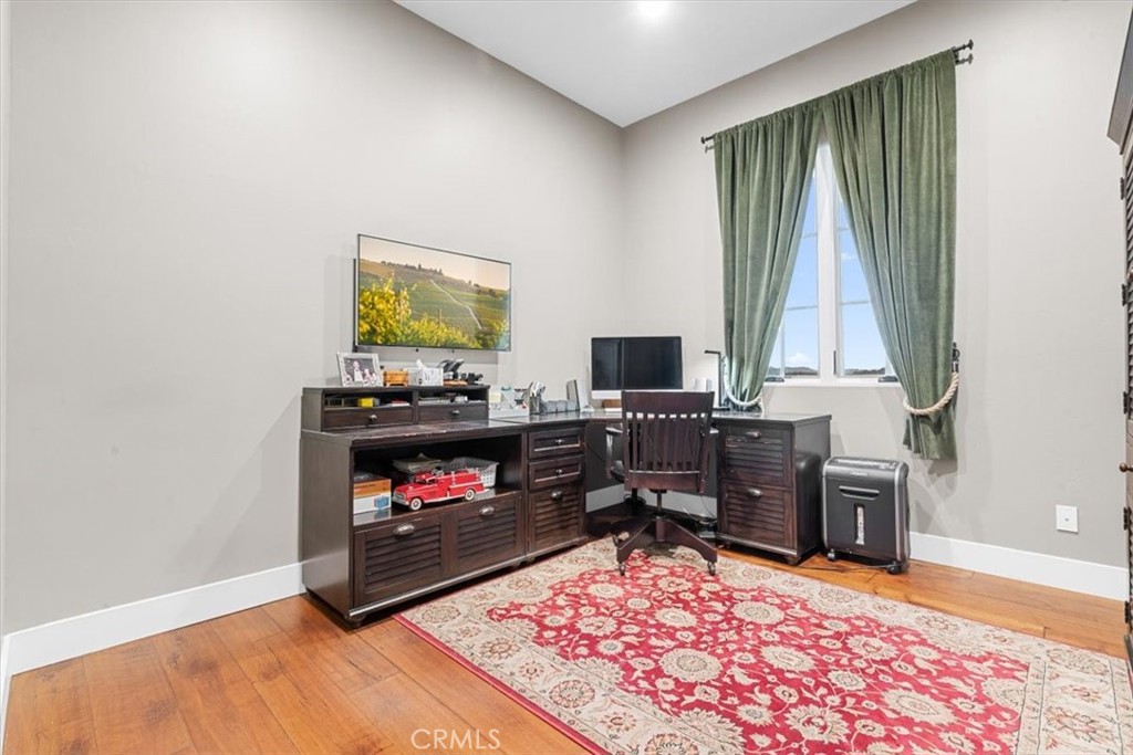 455 Mission Springs Road Arroyo Grande, CA 93420 - Photo 35 of 65 a living room with furniture and a flat screen tv