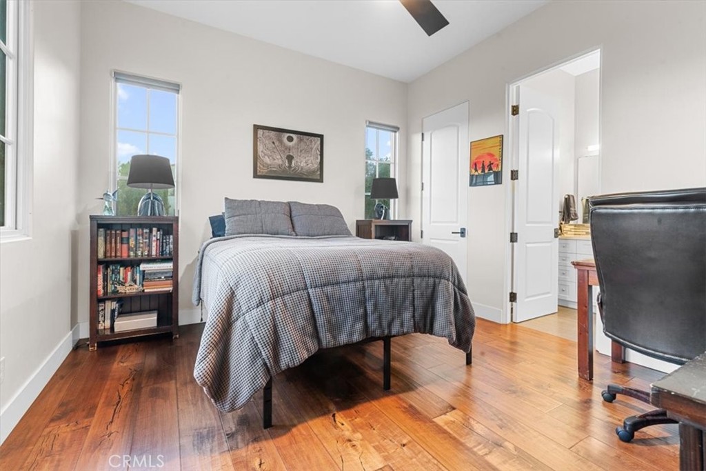 455 Mission Springs Road Arroyo Grande, CA 93420 - Photo 36 of 65 a bedroom with a bed closet and a flat tv screen