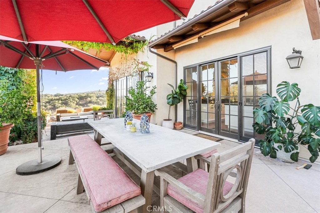 455 Mission Springs Road Arroyo Grande, CA 93420 - Photo 48 of 65 a view of an outdoor space with patio furniture and potted plants