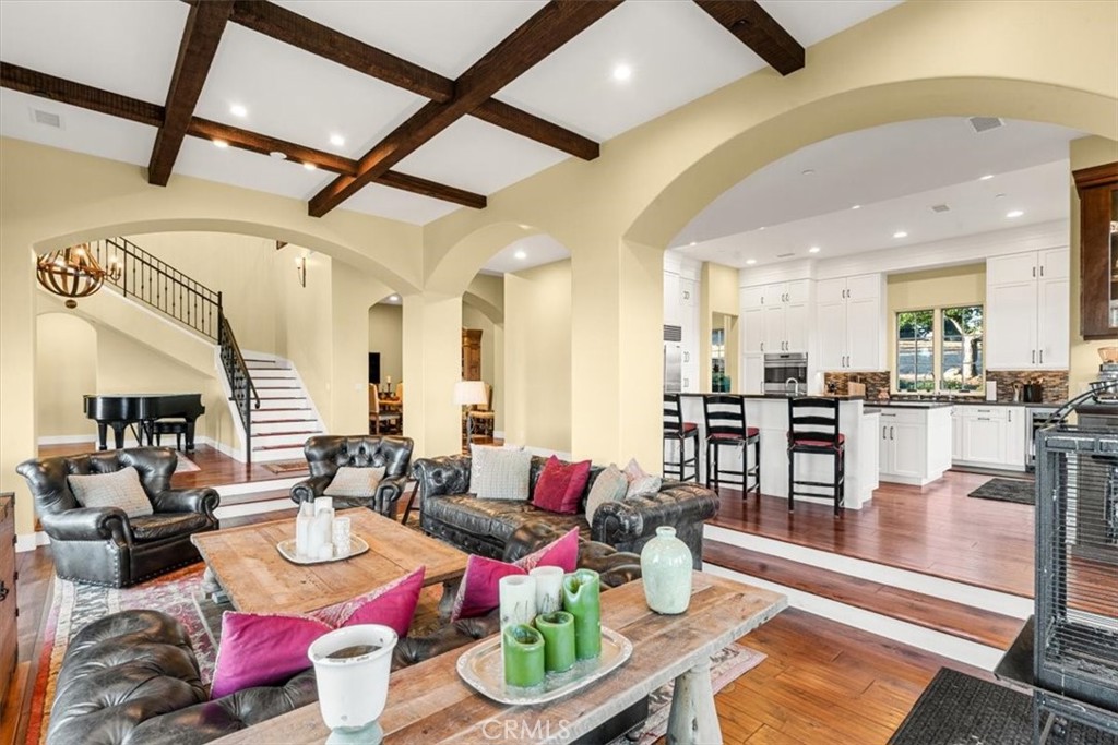 455 Mission Springs Road Arroyo Grande, CA 93420 - Photo 8 of 65 a living room with lots of furniture and a dining table with wooden floor