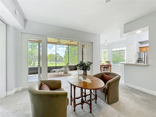 a kitchen with a sink cabinets and window