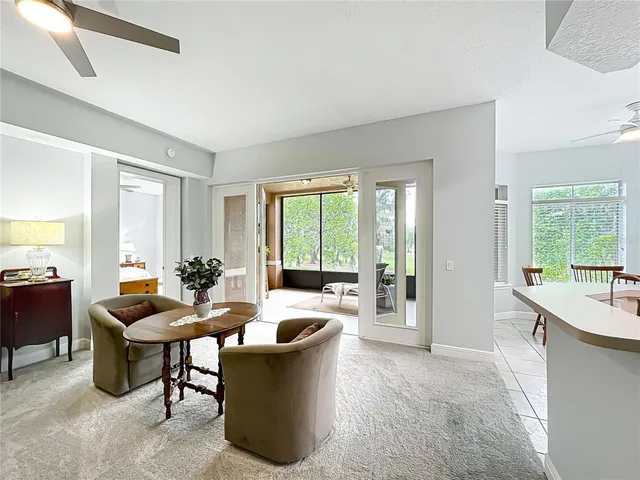 a kitchen with stainless steel appliances granite countertop a stove microwave and refrigerator