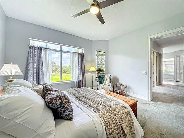 a en suite bathroom with a double vanity sink a mirror and a shower