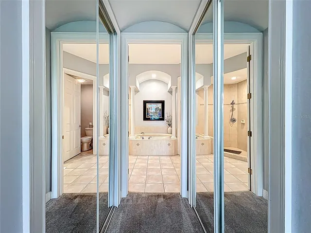 a living room with furniture a window and a table