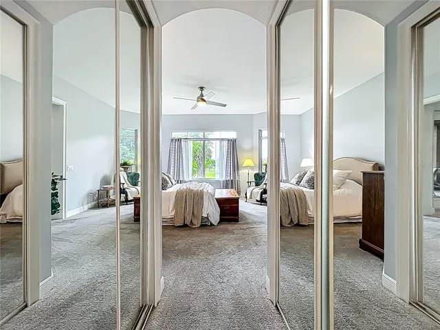 a aerial view of a house with a yard