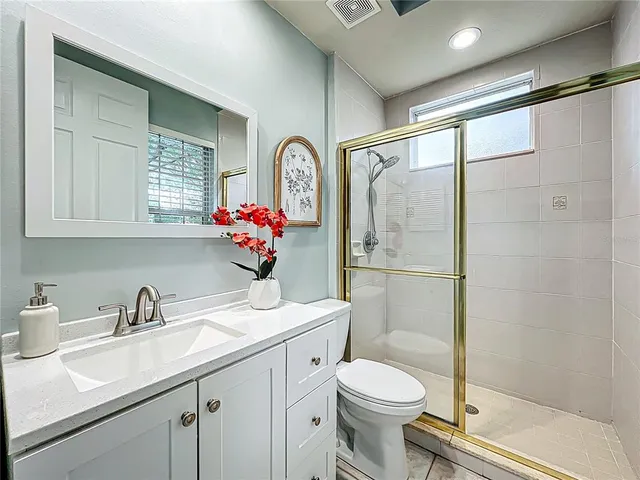 a view of a garden with an outdoor space