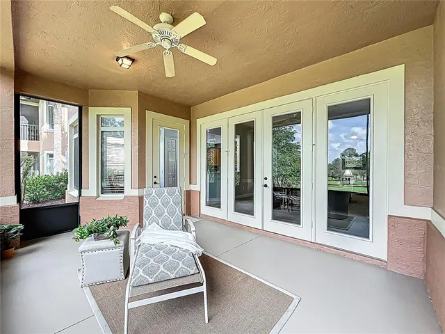 an aerial view of residential house with outdoor space and swimming pool