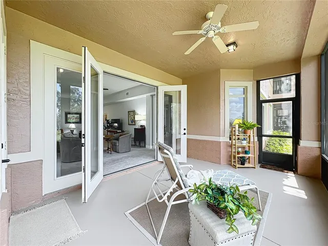 an aerial view of a house with garden space and swimming pool